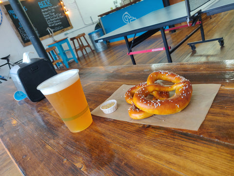 fresh pretzels and local beer by the ping pong table